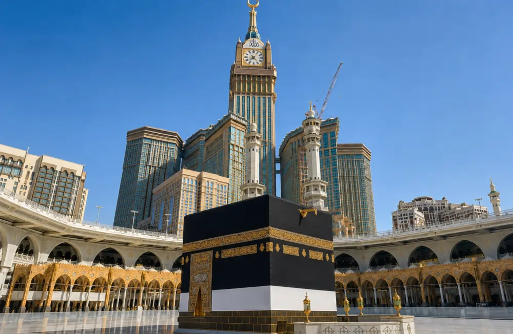 The Holy Kaaba at Masjid al-Haram, with the Abraj Al Bait Clock Tower behind it, represents the enduring heart of Islamic worship and pilgrimage.